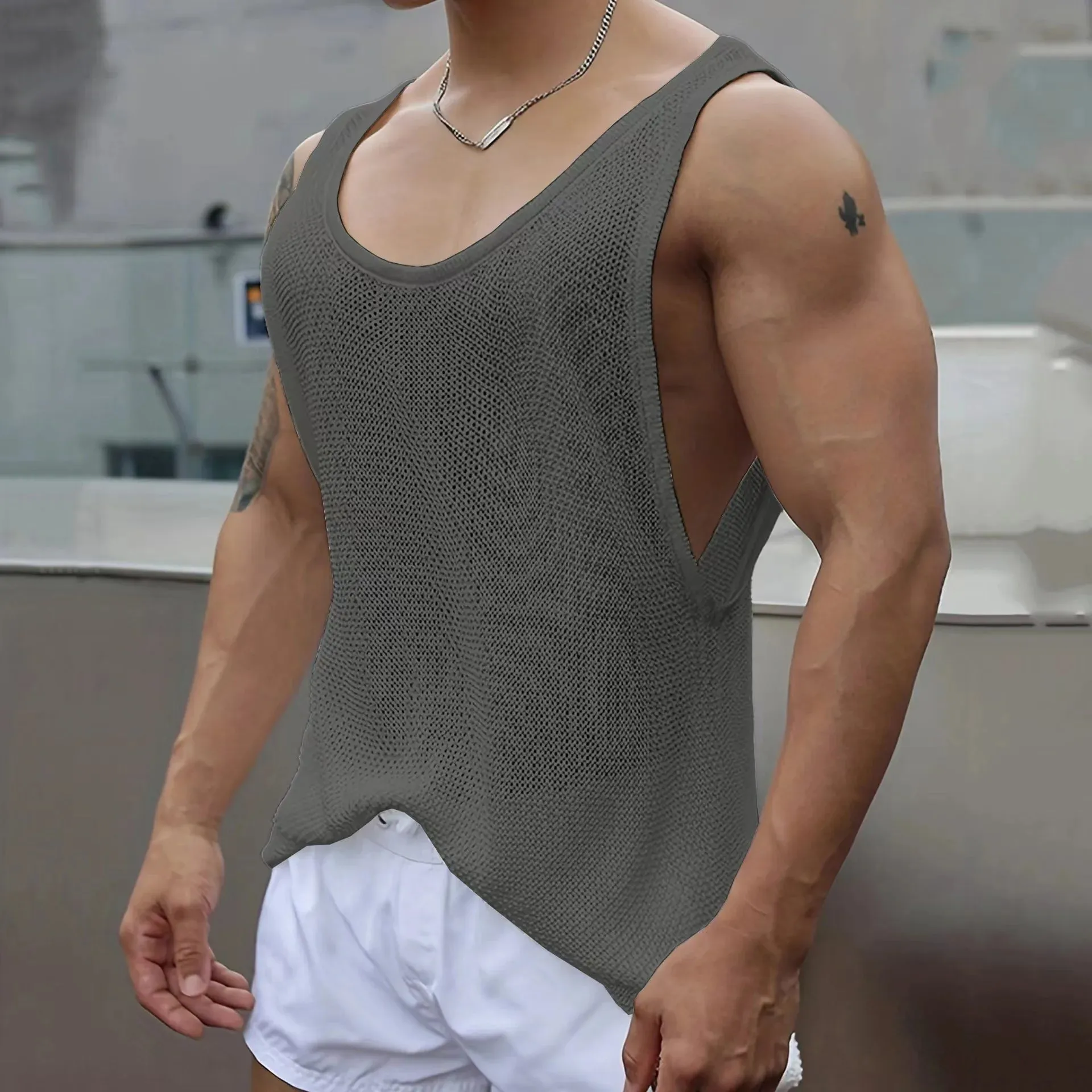 Wiaofellas  -  Summer Thin Knit Vest Men Loose Sleeveless T-shirt Tank Top Sexy Solid Color Hollowed Out Tees Tshirts Knitwear Clothing For Men